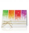     Karácsonyi képeslap - 150x100 mm - felfelé nyitható - fehér gyöngyházfényű karton - színes díszítéssel - szalaggal