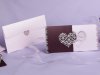   Esküvői meghívó - 215x110 mm - tasak: bordó karton, fehér csillámporos díszítéssel - betétlap:felfelé nyíló rózsaszín lap, szív alakú ablakkal - boríték: rózsaszín, bordó díszítéssel
