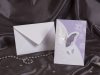     Esküvői meghívó - 100x150 mm - oldalra 3 részre nyitható - halvány lilás mintával, ezüstözéssel, domborítással - záródása pillangó alakú kivágásnál