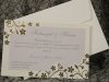 Esküvői meghívó - 170x110 mm - hátsólap: krémszínű gyöngyházfényű karton, aranyozással-domborítással, kivágással - előlap: ezüst színű gyöngyházfényű karton - boríték: matt krémszínű