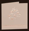 Karácsonyi üdvözlőlap - 135x135 mm - oldalra nyitható - homokszínű gyöngyházfényű karton - ezüst és rózsaszín fóliadíszítéssel, domborítással