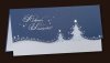   Karácsonyi üdvözlőlap - 210x100 mm - felfelé nyitható - borító: világoskék gyöngyházfényű karton ezüstözéssel, formakivágással - betétlap: fehér gyöngyházfényű lap, elején fényes kék mintával