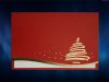     Karácsonyi üdvözlőlap - 150x100 mm - felfelé nyitható - borító: piros bordázott karton, fényes arany díszítéssel, alul formavágással - betétlap: hajtogatott fehér bordázott lap